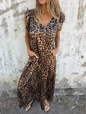 Vestido Maxi Viscose com Estampa de Leopardo e Bolsos Frontais